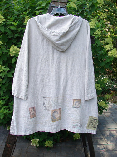 1998 Traveler's Jacket with celestial travel theme, tea dye color, and corded linen hoodie. OSFA.