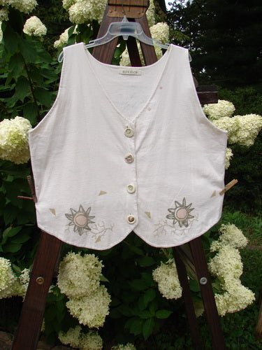 1995 Folk Vest with Sun Star Theme, made from Organic Cotton, featuring Ceramic Stamped Buttons and Tuxedo Styled Front Hemline. Size 2.