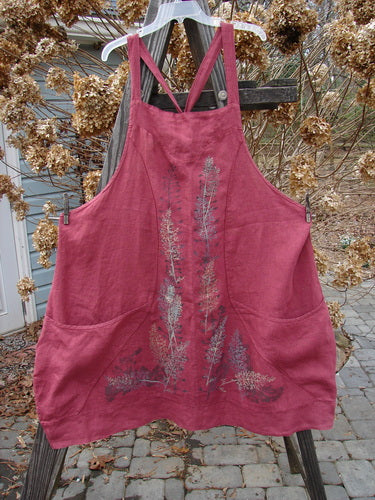 Barclay Linen Figure 8 Apron Jumper with Wild Flower Sprig design. A versatile, lightweight ruby apron dress with curvy figure 8 seams, banded hemline, and drop flop pockets. Size 2.