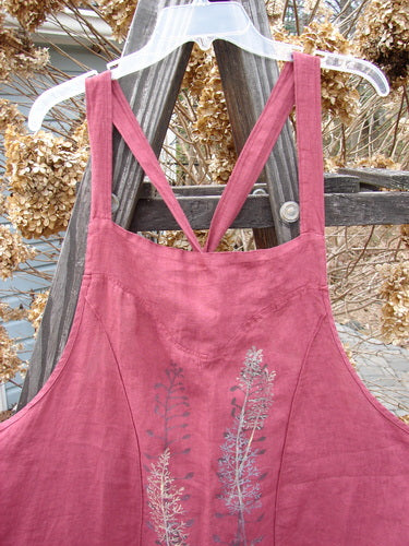 Barclay Linen Figure 8 Apron Jumper with Wild Flower Sprig design. Versatile shoulder straps, curvy seamed figure 8 front and rear, banded hemline, A-line shape, oversized half oval top drop flop pockets, and unique figure 8 curved seams throughout. Size 2.