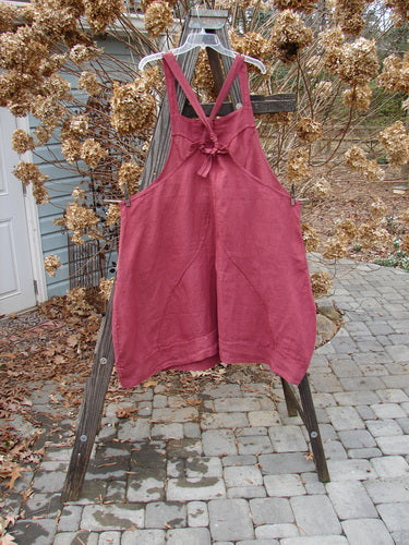Barclay Linen Figure 8 Apron Jumper with Wild Flower Sprig pattern. Versatile shoulder straps, curvy seamed figure 8 front and rear, banded hemline, A-line shape, oversized half oval top drop flop pockets, and unique figure 8 curved seams throughout. Size 2.