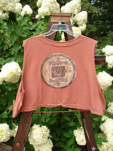 1994 Spruance Vest featuring a medallion rose theme on Monrovian Brick cotton. A unique crop layering length with a wide A-line flare.