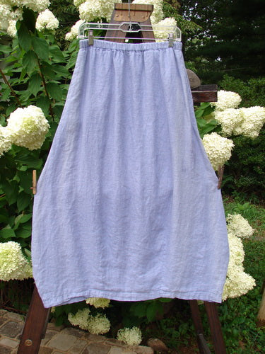 1999 Windy Day Skirt Unpainted Iris Size 1: A blue skirt with a lovely bell shape and vertical pleats, made from handkerchief linen. Perfect for a warm breeze.