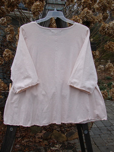 Image alt text: "Barclay Three Quarter Sleeved Textured A Lined Tee Top Cloud Burst Natural Size 2 - A white shirt with three-quarter sleeves and a textured pattern, featuring a rounded neckline and little curly edgings. The design includes a significant continuous cloud burst theme paint, made from a cozy spring breathing fabric."