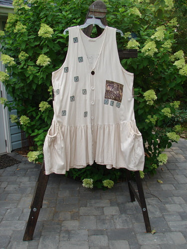 Image alt text: "1995 Voyager Vest Festive Train Travel China Size 2: White dress on a rack with patches, elastic side drop pockets, and train theme paint."