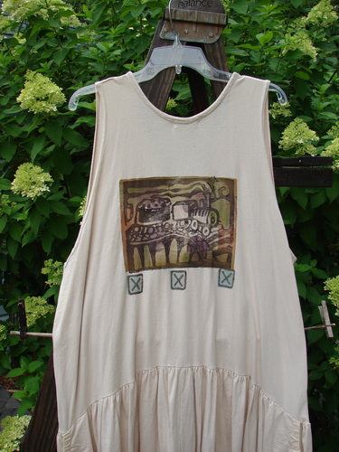 1995 Voyager Vest with train theme paint, size 2. White tank top with graphic. Elastic side pockets. Organic cotton. 40" length.
