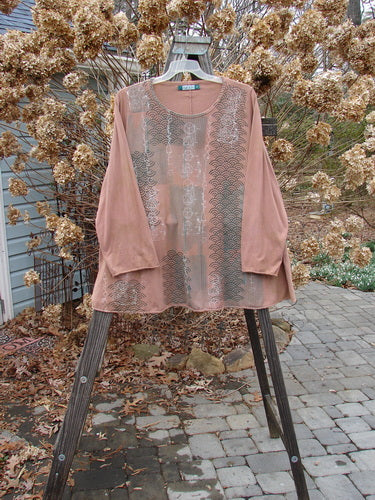 A pink Barclay Long Sleeved A Lined Tee Top with metallic continuous grid paint, featuring a swinging A-line shape and cozy long sleeves. Made from mid-weight organic cotton in mottled caramel. Bust: 52, Waist: 54, Hips: 60, Sweep: 80, Length: 30 inches.