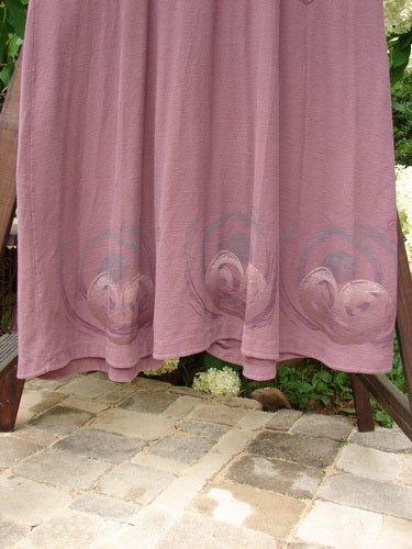 2000 Crepe Tara Dress Celtic Loam Size 1: Elegant pink dress with delicate buttons, empire waist, and flowing drape. Made from 100% cotton crepe.