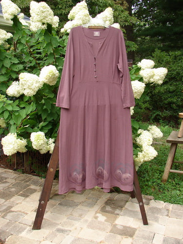 2000 Crepe Tara Dress Celtic Loam Size 1: Elegant purple dress with pewter buttons, empire waist, and flowing hemline.