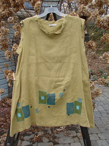 Barclay Linen Mid Layer Cap Sleeve Tunic Geometric Mustard Size 2: A unique tunic with a widening hemline, curved waist seam, and mock Mandarin collar. Perfect for a different, sweet look.