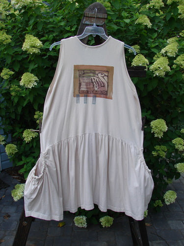 1995 Voyager Vest with Festive Swan Theme Paint. Organic cotton vest with elastic side drop pockets. Deep V neckline and gathered bottom flounce. Bust 54, Waist 54, Hips 56, Length 40.