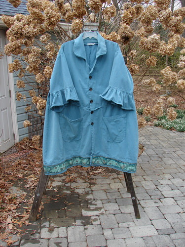 Barclay Decora Brushed Twill Flutter Coat Vine Flower Peacock Size 2: A stunning coat with a deep V neckline, ruffle sleeves, and a paneled swingy hemline. Features a vibrant vine garden theme.