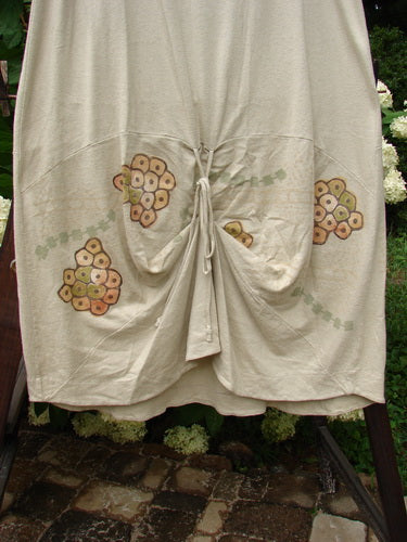 A white cotton hemp blend shade skirt with a unique design. Features include an elastic waistband, adjustable hemline, and creative adjustments. Size 1.