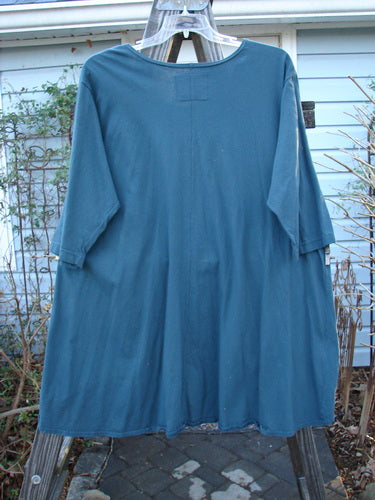 Image alt text: "Barclay NWT High Low Top, green mineral, size 2, on a clothes rack"