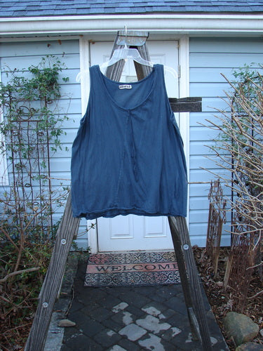 A navy Barclay Batiste Decora Tiny Tank in size 2, unpainted. Features a shorter, slight A-line shape with a front vertical neckline tie and gather. Perfect condition.
