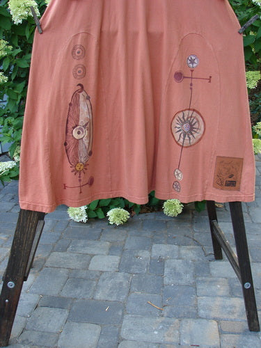 Image alt text: "1998 4 Elements Tress Weathervane Arausio Size 2 dress on a rack, close-up of dress, metal screw on wood post"
