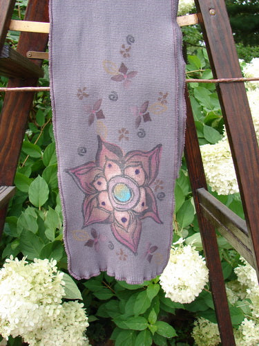 Barclay Thermal Double Layered Scarf with Tiny Floral Design in Light Plum. Sweet curly edges, waffle textured, fully stitched finish. Cozy and stretchy. Measures 8" wide and 52" long.