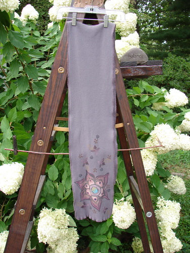 Barclay Thermal Double Layered Scarf Tiny Floral Light Plum One Size: A cozy scarf with sweet curly edges, waffle texture, and a giant lower floral design accented with tiny flowers. Measures 8" wide and 52" long.