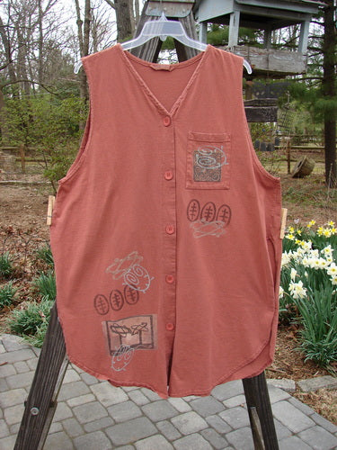 1995 Breeze Vest Space Odyssey Russet OSFA: A red shirt with drawings on it. Features include a rounded front and back shirttail hemline, deep V-shaped neckline, tall rounded vented sides, front painted breast pocket, sweet tabbed upper rear, super back drop gathers, and original Blue Fish recycled paper buttons. Bust 56, waist 56, hips 62, front and back lengths 41, side lengths 35 inches.
