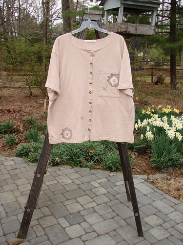 1994 Camp Shirt Fish Medallions Natural Flaxen Size 2: A shirt on a rack with a close-up of fish and medallion details.
