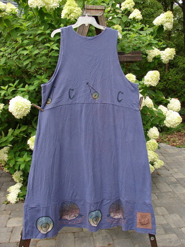 1998 Azoth Vest Mystic Continuous Earth Orion OSFA: A blue dress with a logo on it, featuring a double-paneled bodice, banded hemline, and vintage button.