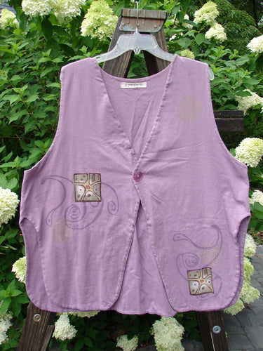 1997 Elements Dock Vest Ocean Life Jasmine Size 2: A purple vest with a design on it, featuring a single button closure, signature patch, high vented rounded sides, and a draw cord back. Made from medium weight organic cotton with an ocean life theme paint. Bust 52, Waist 54, Hips 60, Length 30.