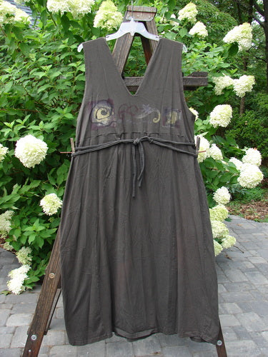 1994 Scroll Jumper Wind Edo Black OSFA: A dress on a wooden stand, featuring a double-paneled upper, V-shaped neckline, deep arm openings, and an empire waist seam.