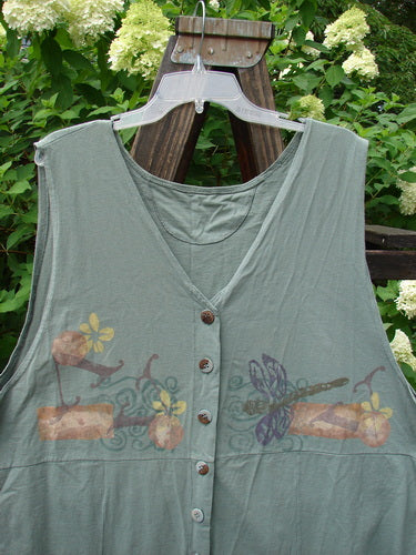 1994 Cricket Vest Dragonfly Garden Seaweed Size 2: A green shirt with a dragonfly design on it, perfect for any day.