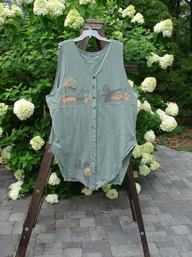 1994 Cricket Vest Dragonfly Garden Seaweed Size 2: A shirt on a rack with a green dragonfly garden theme paint and smaller buttons.