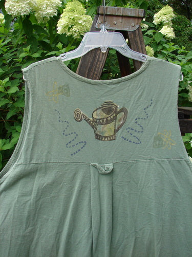 1995 Breeze Vest with a water can theme painted on a green dress. Perfect condition. Organic cotton. Bust 56, Waist 56, Hips 62.