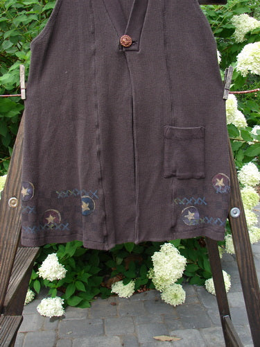 1999 Thermal A Line Vest Star Bounce Currant Size 1: A brown skirt with buttons and a button on it, from the Holiday Winter Collection.
