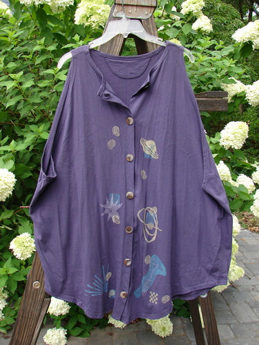 1994 Sleeveless Vest Celestial Blueberry Size 1: A purple shirt with a celestial design, deep arm openings, and vintage buttons.