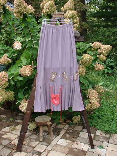 1997 Shell Fish Skirt with Seahorse and Sea Urchin print, size 2, on a rack.