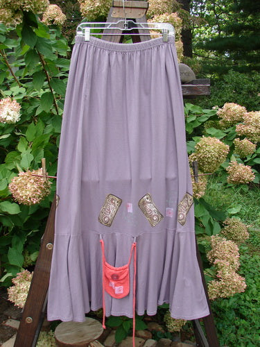 1997 Shell Fish Skirt with Seahorse and Sea Urchin print, size 2, hanging on a clothesline.