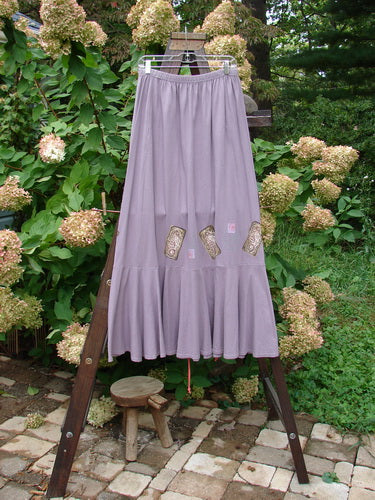 1997 Shell Fish Skirt Seahorse Sea Urchin Size 2: A long purple skirt with a ruffle, featuring a seahorse and a 12-inch bottom kick flounce.