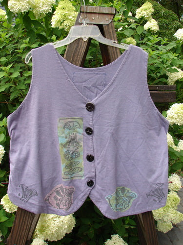 1993 The Vest Mushroom Garden Periwinkle Size 1: A vintage oversized cotton vest with tuxedo-style front tails, original blue fish buttons, and a crop draw corded back. Features a heart signature 93 patch and a mushroom garden theme paint.