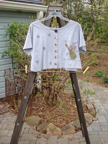1994 Song Top Vintage Kitchen Garden Lavender Size 1: A shirt with a design on it, featuring a wide boxy shape, shallow neckline, and painted breast pocket.