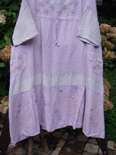 Barclay Linen Contrast Drop Pocket Dress Tiny Flower Heathered Lilac Size 2: A lovely dress with a flower design, drop pockets, and a flutter flounce.