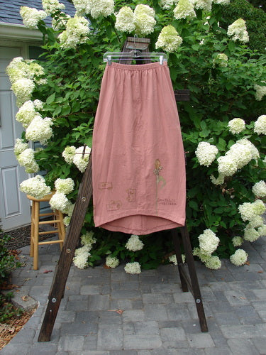 1998 Botanicals Corolla Skirt Digitalis Magnolia Size 1: A slenderizing skirt with a full elastic waistband and upward scooped front hemline, made from organic cotton. Perfect condition.