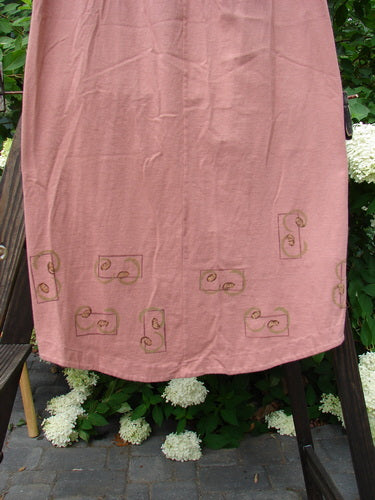 1998 Botanicals Corolla Skirt Digitalis Magnolia Size 1: A slenderizing pink skirt with brown designs, featuring a full elastic waistband and a beautifully upward scooped front hemline in the Botanicals Digitalis theme.