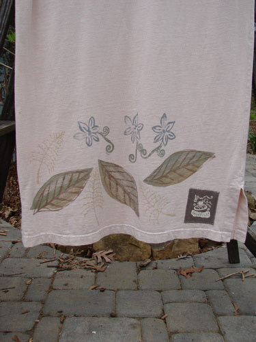 A 1999 Straight Dress Window Chair Teadye Size 0: a towel with leaves and flowers on it, perfect condition, made from organic cotton.