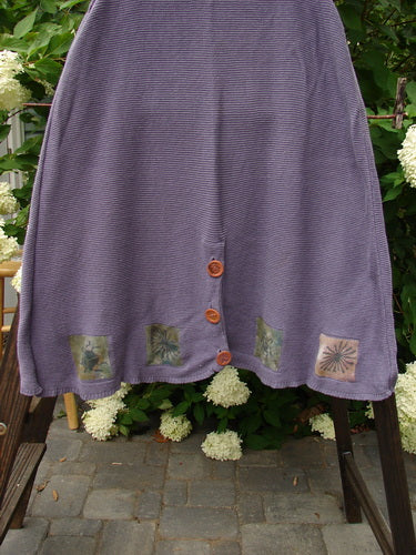 1994 Vent Vest Sweater Jumper Sea Life Periwinkle OSFA: A purple skirt with buttons, featuring a lovely weight and detailed hemline whimsical nature paint.
