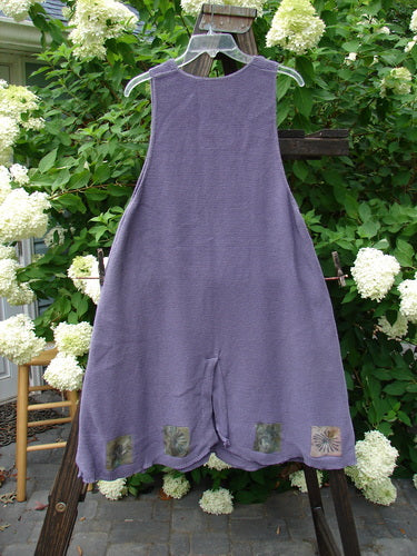 1994 Vent Vest Sweater Jumper Sea Life Periwinkle OSFA: A purple dress with a detailed hemline and clay buttons, perfect for a smaller bust and generous hip flair.