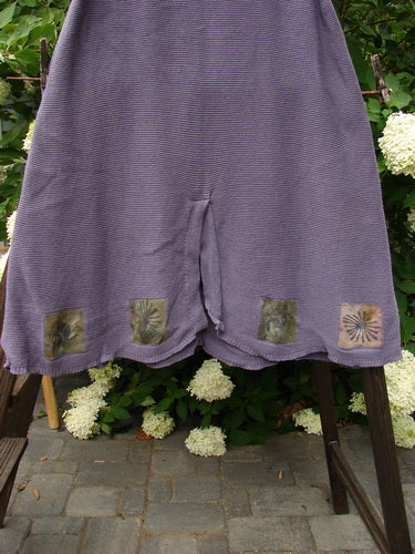 1994 Vent Vest Sweater Jumper Sea Life Periwinkle OSFA: A pair of purple shorts with patches on them, perfect for the smaller fisher.