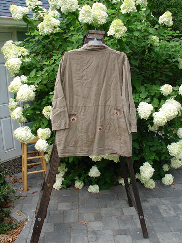 1998 Botanicals Herbary Jacket: Heavy Weight Linen jacket on a rack with ceramic buttons, painted pockets, and a botanical theme. Bust 50, Waist 50, Hips 50, Length 32.