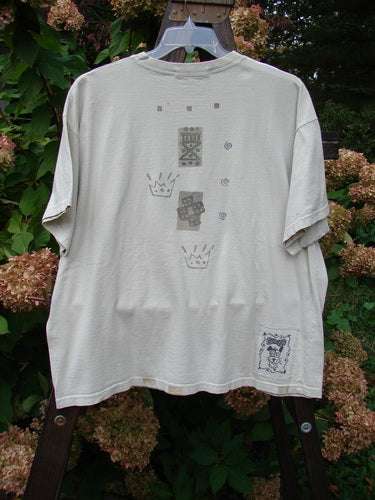1995 Short Sleeved Crop Tee Doggie Bone Beach Glass Size 1: White tee with doggie bone designs, drop shoulders, and thicker ribbed neckline. Perfect condition, mid-weight cotton. Bust 52, waist 52, hips 52, length 27.
