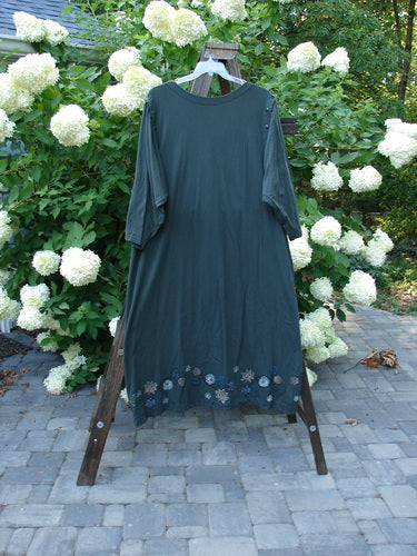 Image alt text: 1994 Convertible Coat with Spin Flower design, Deep Moss color, on a rack