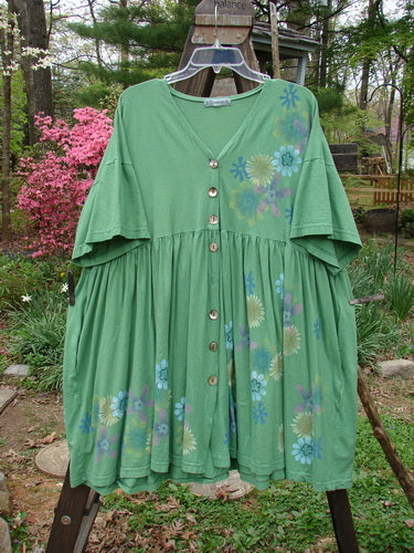 Barclay Tree Top Cardigan Dress Floral Blossom Spearmint Size 3: A green dress with flowers, featuring a sweet baby doll style, vintage buttons, V neckline, gathered full lower, and slight empire waist.