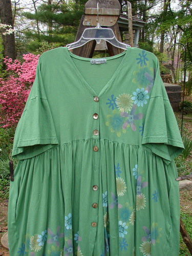 Barclay Tree Top Cardigan Dress Floral Blossom Spearmint Size 3: A green shirt with flowers on it, featuring a sweet baby doll style, vintage buttons, and a gathered full lower.