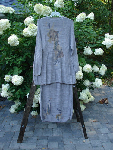 1995 Cotton Rayon Linear Column Sweater Duo Pike Dusk Mélange OSFA Size 1: Grey dress and shirt on stand and swinger. Towel on ladder.